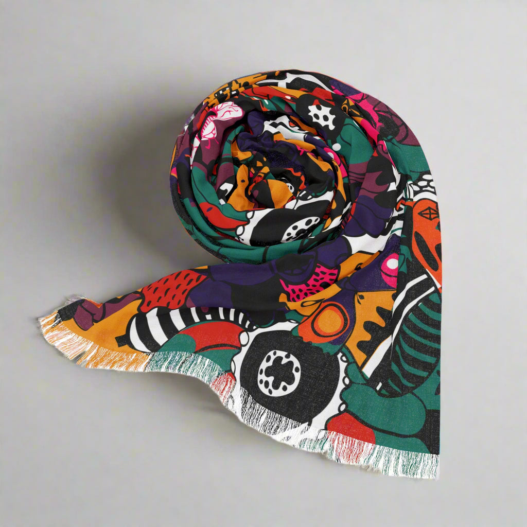 jeweltoned colorful light scarf one-sided print rolled up on white background