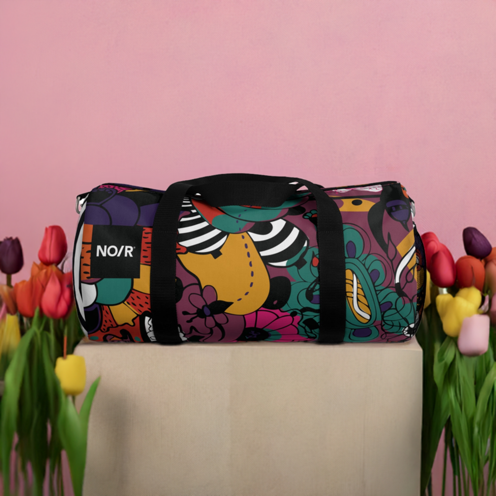 NO/R X BONGANG JEWEL Duffel Bag featuring vibrant, abstract artwork by Kevin Bongang. The bag showcases a dynamic fusion of colors and patterns, transforming a classic travel accessory into a wearable piece of art."