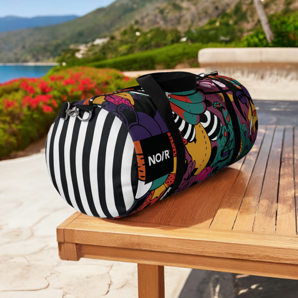 NO/R X BONGANG JEWEL Duffel Bag featuring vibrant, abstract artwork by Kevin Bongang. The bag showcases a dynamic fusion of colors and patterns, transforming a classic travel accessory into a wearable piece of art."