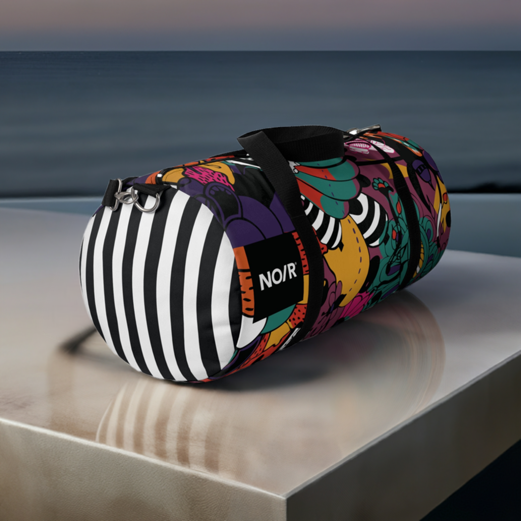 NO/R X BONGANG JEWEL Duffel Bag featuring vibrant, abstract artwork by Kevin Bongang. The bag showcases a dynamic fusion of colors and patterns, transforming a classic travel accessory into a wearable piece of art."